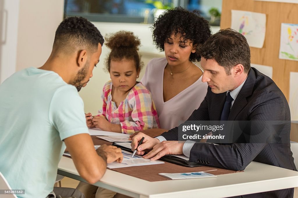 Financial advisor discussing with his clients
