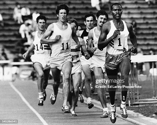 Kenyan long distance runner Kip Keino leads the field during the 2 mile race, ahead of Ricky Wild , Allan Rushmer, Peter Stewart and Emiel Puttemans...