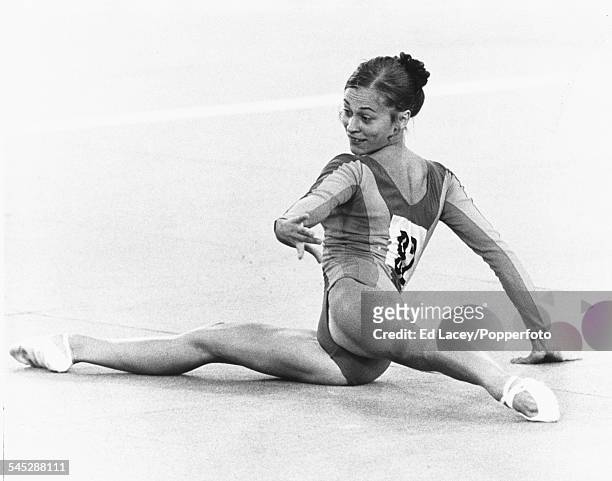 East German gymnast Angelika Hellmann in action competing for the East Germany team on the floor to finish in 6th place in the Women's artistic...