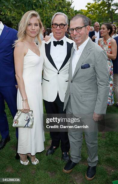 Sienna Miller, Tommy Hilfiger and Jonathan Newhouse attends the Serpentine Summer Party co-hosted by Tommy Hilfiger at the Serpentine Gallery on July...