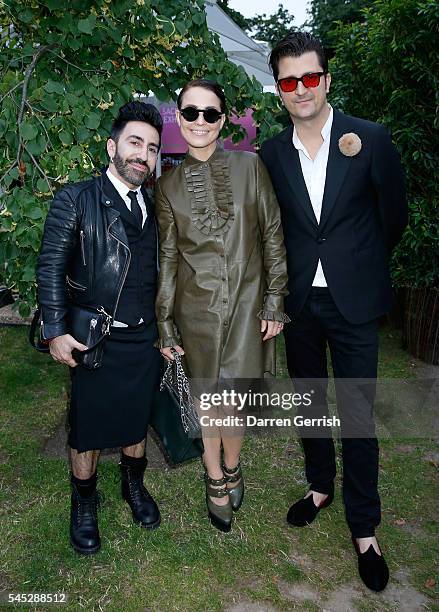 Johnny Coca, Noomi Rapace and guest attends the Serpentine Summer Party co-hosted by Tommy Hilfiger at the Serpentine Gallery on July 6, 2016 in...