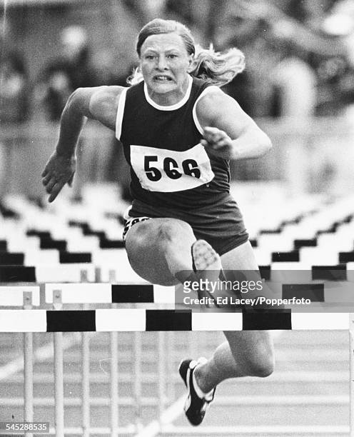British and Norethern Ireland athlete Mary Peters takes part in the hurdle event of the pentathlon at the Commonwealth Games in Christchurch, New...