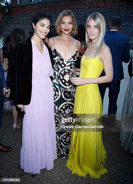 Caroline Issa, Arizona Muse and Georgie Macintyre attends the Serpentine Summer Party co-hosted by Tommy Hilfiger at the Serpentine Gallery on July...