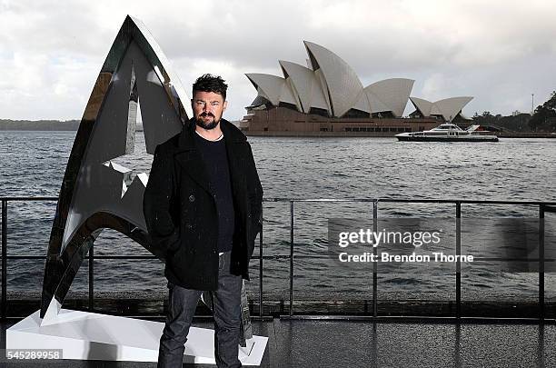 Karl Urban poses during a photo call for Star Trek Beyond on July 7, 2016 in Sydney, Australia.