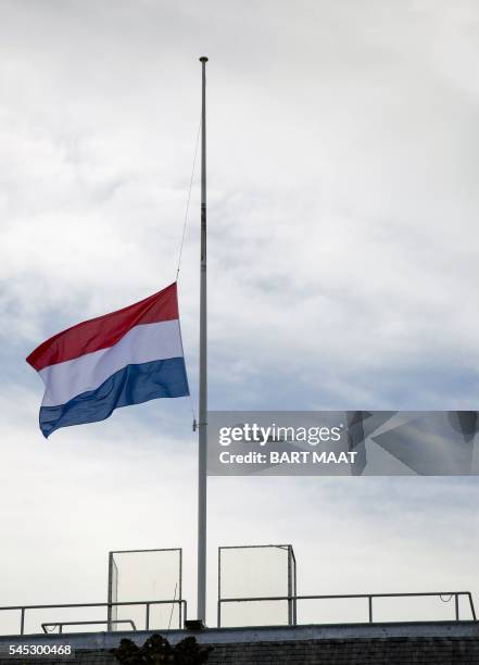 The Dutch flag flies at halfmast at the Ministery of Defense in The Hague, The Netherlands, on July 7, 2016 after two Dutch UN peacekeepers were...