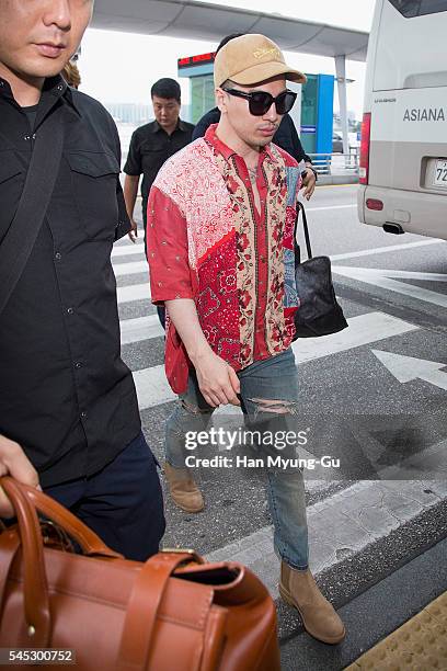 Taeyang of South Korean boy band Bigbang is seen on departure at Incheon International Airport on July 7, 2016 in Incheon, South Korea.