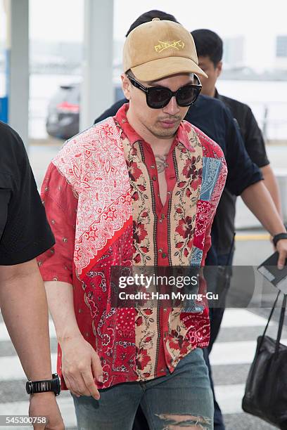 Taeyang of South Korean boy band Bigbang is seen on departure at Incheon International Airport on July 7, 2016 in Incheon, South Korea.