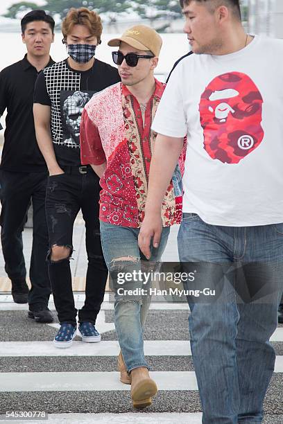 Taeyang of South Korean boy band Bigbang is seen on departure at Incheon International Airport on July 7, 2016 in Incheon, South Korea.