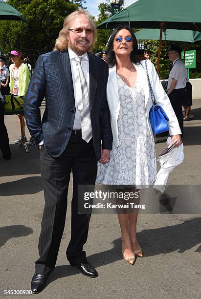 Barry Gibb and wife Linda attend day ten of the Wimbledon Tennis Championships at Wimbledon on June 27, 2016 in London, England.