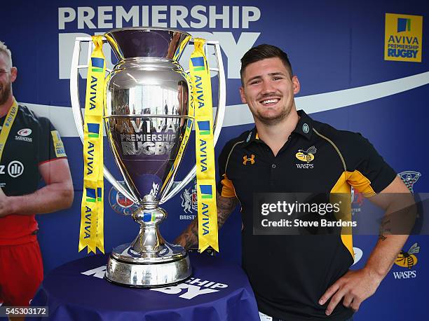 Guy Thompson of Wasps poses with the Aviva Premiership Trophy during the 2016-17 Aviva Premiership Rugby Season fixtures announcement at BT Tower on...