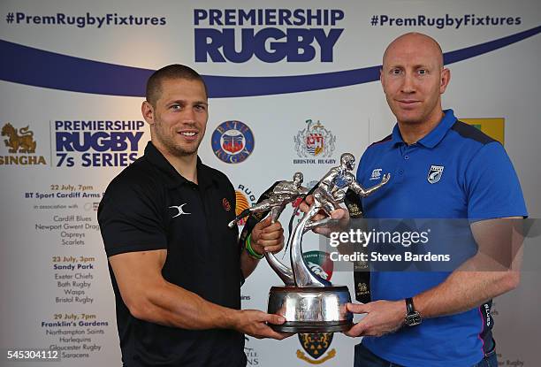 Geraint Rhys Jones of Newport Gwent Dragons and Tom Shanklin of Cardiff Blues poses with the Singha Sevens trophy during the 2016-17 Aviva...