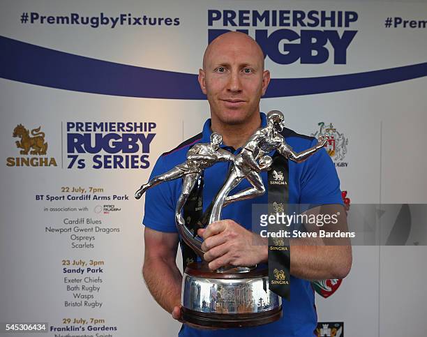 Tom Shanklin of Cardiff Blues poses with the Singha Sevens trophy during the 2016-17 Aviva Premiership Rugby Season fixtures announcement at BT Tower...