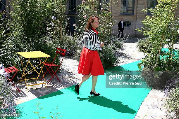 French Minister for Ecology, Sustainable Development and Energy Segolene Royal walks to greet Queen Letizia of Spain on July 7, 2016 in Paris, France.