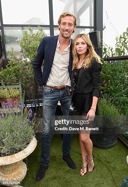 Peter Crouch and Abbey Clancy attends Warner Music Group Summer party in association with British GQ and Quintessentially on July 6, 2016 in London,...