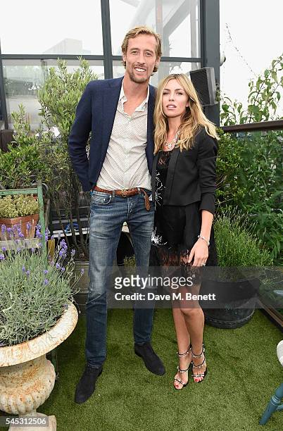 Peter Crouch and Abbey Clancy attends Warner Music Group Summer party in association with British GQ and Quintessentially on July 6, 2016 in London,...