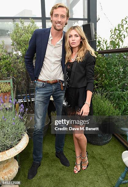 Peter Crouch and Abbey Clancy attends Warner Music Group Summer party in association with British GQ and Quintessentially on July 6, 2016 in London,...