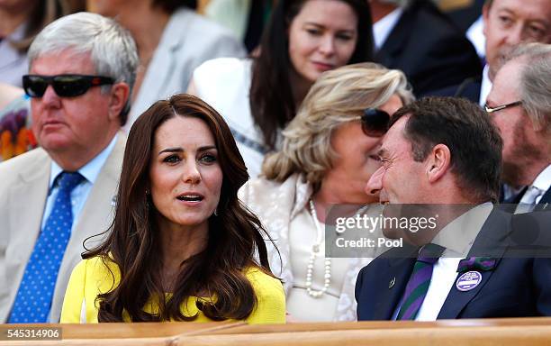 Catherine, Duchess of Cambridge and Phill Brook watch on from The Royal Box as Serena Williams of The United States faces Elena Vesnina of Russia...