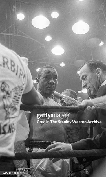 Sonny Liston looks at the camera after failing to answer the the bell of the 7th round at the Convention Center in Miami Beach, Florida, February 25,...