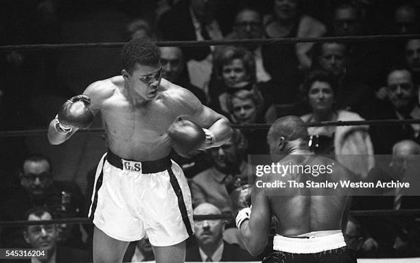 Cassius Clay and Doug Jones exchange blows during their heavyweight bout at Madison Square Garden, New York, New York, March 13, 1963.