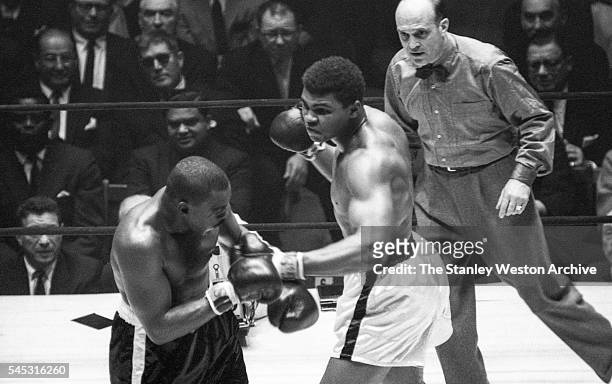 Cassius Clay in action, throwing a lright vs Doug Jones during their heavyweight bout at Madison Square Garden, New York, New York, March 13, 1963.