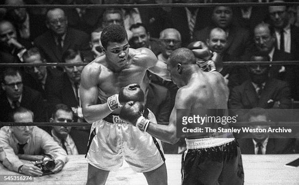 Cassius Clay in action, throwing a left vs Doug Jones during their heavyweight bout at Madison Square Garden, New York, New York, March 13, 1963.