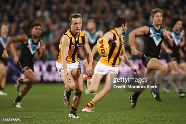 Billy Hartung of the Hawks wins the ball during the round 16 AFL match between the Port Adelaide Power and the Hawthorn Hawks at Adelaide Oval on...