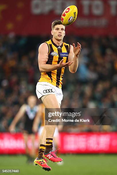 Luke Breust of the Hawks takes a mark during the round 16 AFL match between the Port Adelaide Power and the Hawthorn Hawks at Adelaide Oval on July...