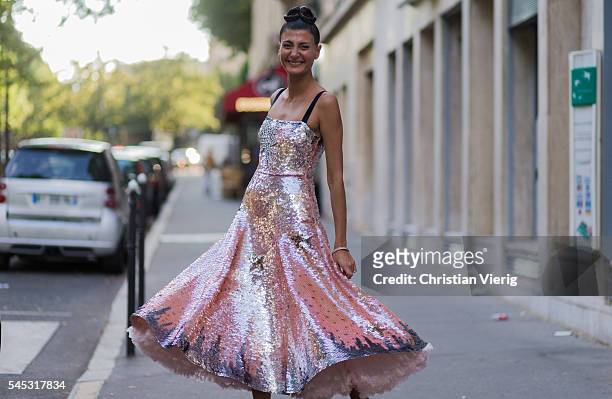 Giovanna Battaglia wearing a dress outside Valentino during Paris Fashion Week Haute Couture F/W 2016/2017 on July 6, 2016 in Paris, France.