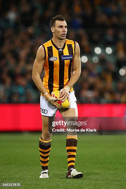 Jonathon Ceglar of the Hawks preapres to kick the ball during the round 16 AFL match between the Port Adelaide Power and the Hawthorn Hawks at...