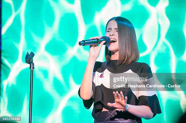 Singer Marina Kaye performs during the "Sunny Side of Life" By Piaget : Launch Partyshow as part of Paris Fashion Week on July 4, 2016 in Paris,...