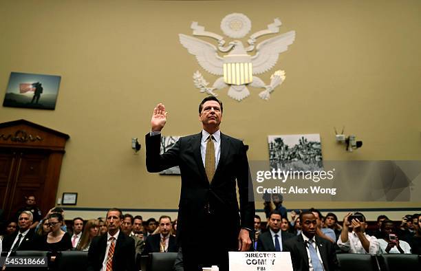 Director James Comey is sworn in during a hearing before House Oversight and Government Reform Committee July 7, 2016 on Capitol Hill in Washington,...