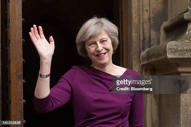 Theresa May, U.K. Home secretary, gestures to members of the media after it was announced she won the second-round ballot of Conservative Party...