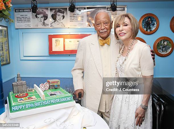 Former New York City Mayor David Dinkins and Ellen Hart Strum pose for a photo with Mayor Dinkin's birthday cake commemorating his 89th birthday at...