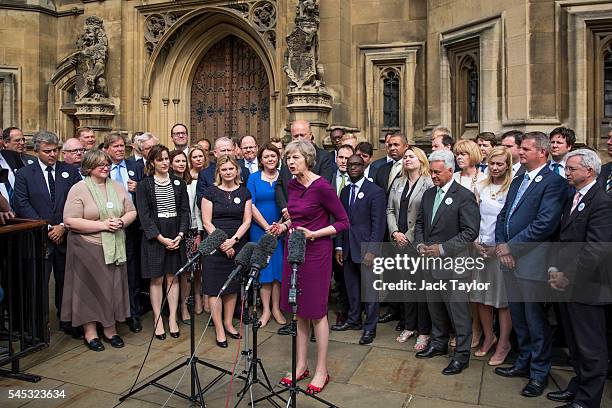 British Home Secretary and Conservative leadership contender Theresa May talks outside the Houses of Parliament on July 7, 2016 in London, England....