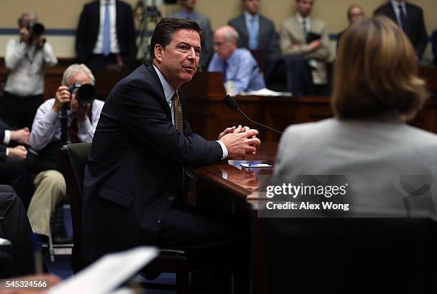 Director James Comey testifies during a hearing before House Oversight and Government Reform Committee July 7, 2016 on Capitol Hill in Washington,...