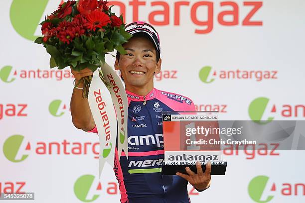 Yukiya Arashiro of Japan riding for Lampre-Merida takes the podium after being named the most aggressive rider following stage six of the 2016 Le...