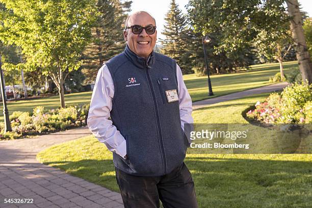 Muhtar Kent, chairman, chairman and chief executive officer of The Coca-Cola Co., arrives for the morning sessions during the Allen & Co. Media and...