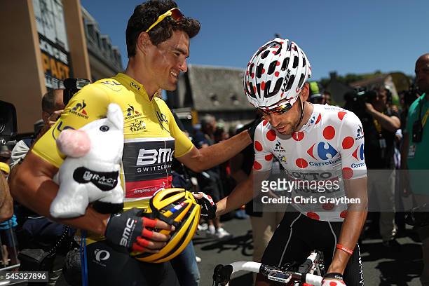 Greg Van Avermaet of Belgium riding for BMC Racing Team in the leader's jersey talks with Thomas De Gendt of Belgium riding for Lotto Soudal in the...