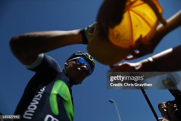 Nairo Alexander Quintana of Colombia riding for Movistar Team signs autographs prior to stage six of the 2016 Le Tour de France a 190.5km stage from...