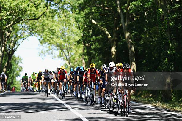 The peloton ride through the French countryside on stage six of the 2016 Tour de France, a 190km road stage from Arpajon-sur-cere to Montauban, on...