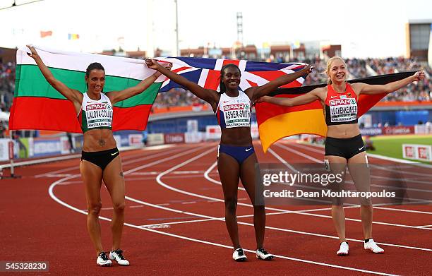 Ivet Lalova-Collio of Bulgaria , Dina Asher-Smith of Great Britain and Gina Luckenkemper of Germany celebrate after finishing in medal positions in...