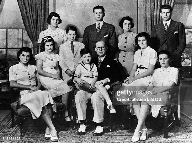 The Kennedy Family in 1938. Joseph and Rose Kennedy with their nine children at Bronxville, New York. From left, seated: Eunice, Jean, Edward ,...