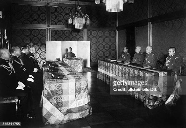 Hirohito, Emperor of Japan, during a conference of the Council of War, to the right: Generals of the Imperial Japanese Army and Imperial Japanese...