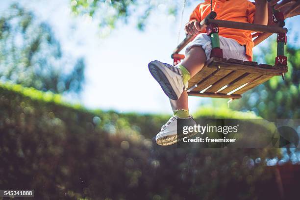 baby on the swing - bush baby bildbanksfoton och bilder