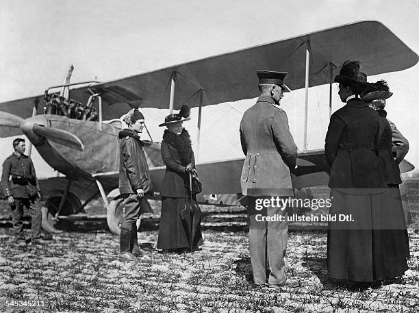 Fighter pilot von Richthofen explains Empress Augusta Victoria his flying machine, Albatros