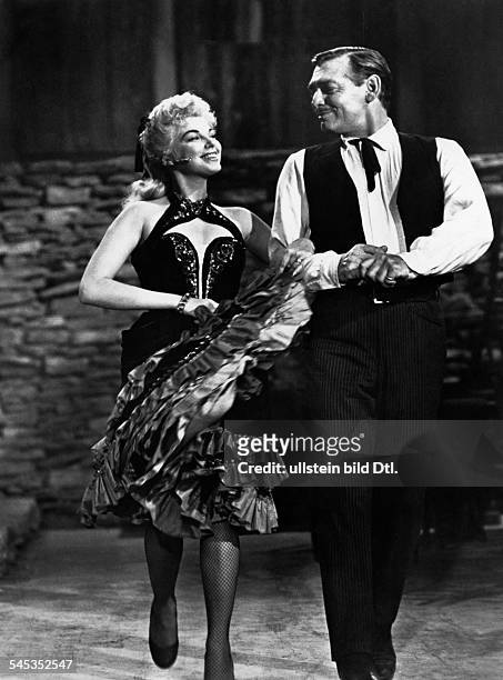 Gable, Clark *-+Schauspieler, USA- mit Barbara Nichols in dem Film 'Heisser Sueden'- 1956
