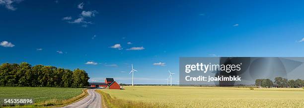 panoramic view of countryside of sweden with wind turbines - panoramic farm stock pictures, royalty-free photos & images