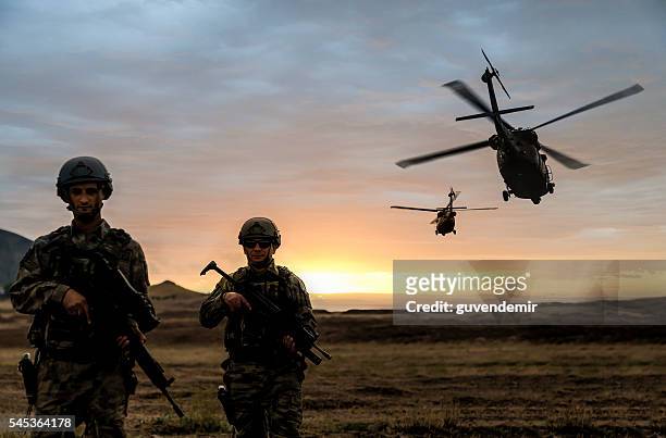 military mission on sunset - military helicopter stock pictures, royalty-free photos & images