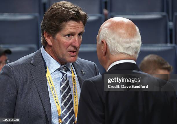 Head coach Mike Babcock speaks to general manager Lou Lamoriello during the 2016 NHL Draft at First Niagara Center on June 25, 2016 in Buffalo, New...