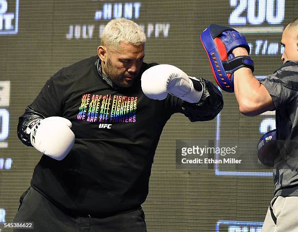 Mixed martial artist Mark Hunt hits punch mitts during an open workout for UFC 200 at T-Mobile Arena on July 7, 2016 in Las Vegas, Nevada. Hunt will...
